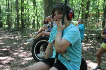 Camper on Tire Swing